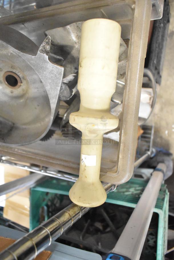 Tier lot including slushie machine hoppers, metal panels, meat grinder tray, and pelican head grating blade.