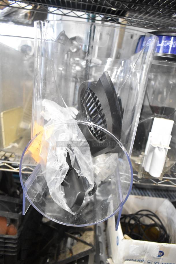 Tiered lot including slushie machine hoppers, metal panels, meat grinder tray, Pelican head grating blade, in mixed condition.