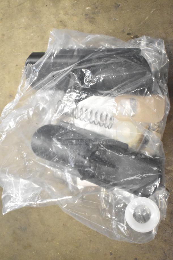 Tier lot of various items in a plastic bag, featuring slushie machine hoppers and a metal meat grinder tray.