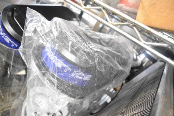 Tier lot featuring slushie machine hoppers with visible "Gourmet Ice" label, wrapped in plastic, along with metal panels.