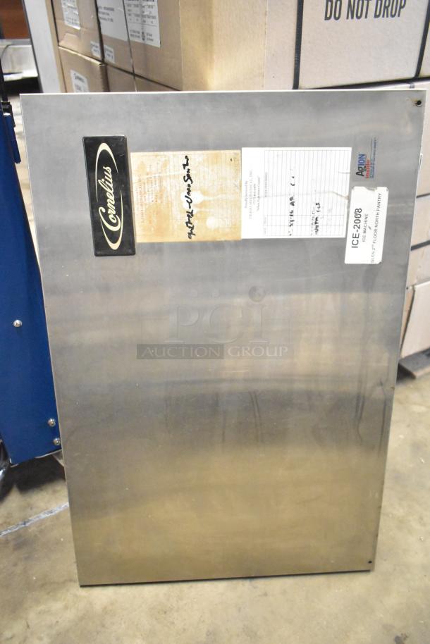 Metal panel with "Cornelius" label, attached forms, showing item part of a lot including slushie machine hoppers.
