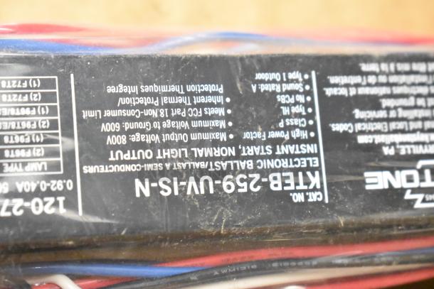 Tiered lot including ice cream machine lids, Danfoss 023Z5029 filter drier, portafilters, H-600 switch kit, Bunn spouts, ballast shown.