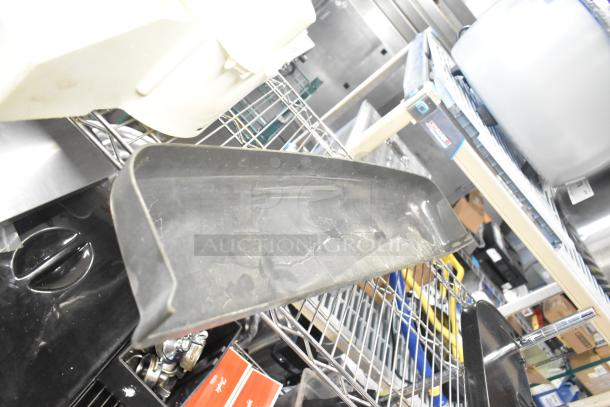 Auction tier lot including Pelican head blade, food processor grating/slicing blades, and meat slicer carriage, used condition.