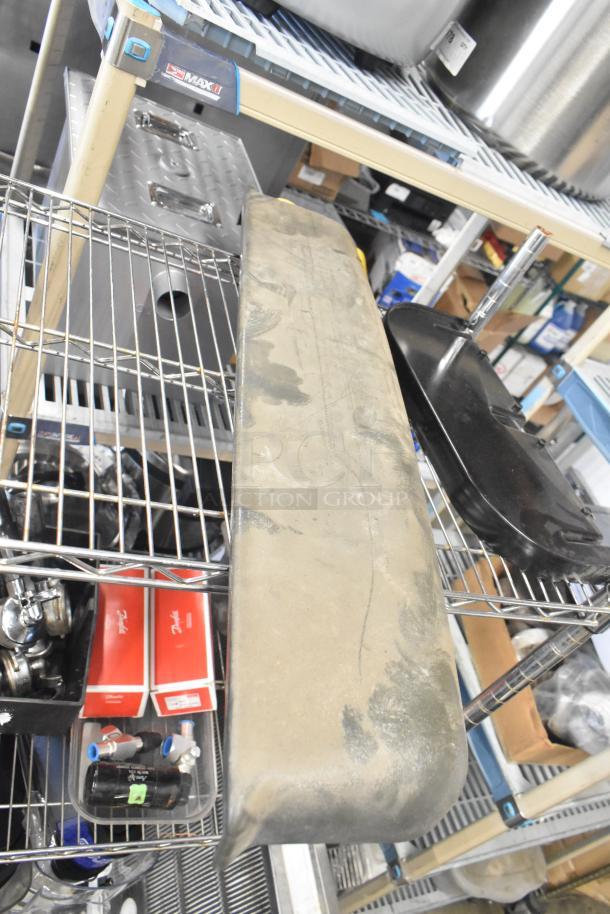 Tiered lot with Pelican head blade, food processor grating/slicing blades, and meat slicer carriage on metal shelving.