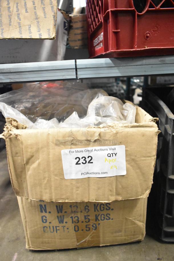 Box of 9 metal grates for range, slightly worn. Label shows item number 232, quantity x9.