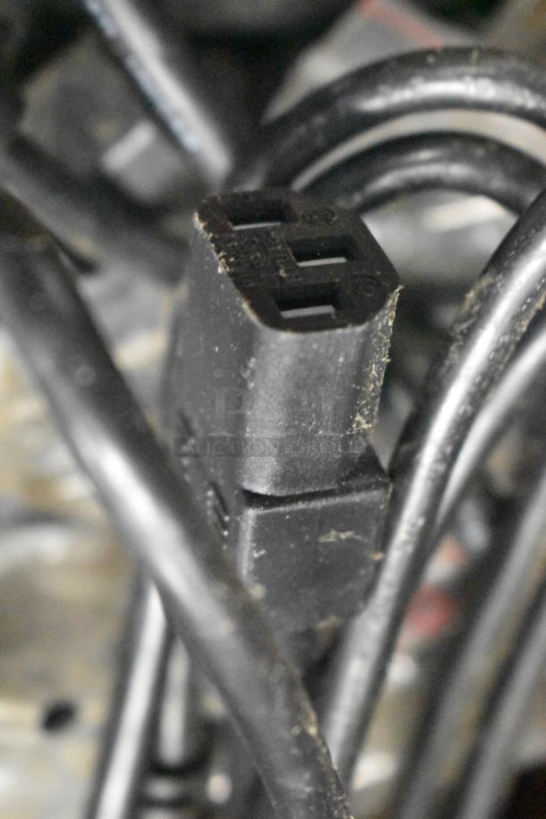 Various range parts lot including black wires and connectors, suitable for repair or replacement, in used condition.