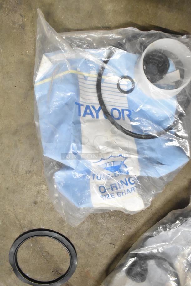 ALL ONE MONEY lot with Taylor ice cream machine parts, including O-rings, adapters, in sealed plastic bags.