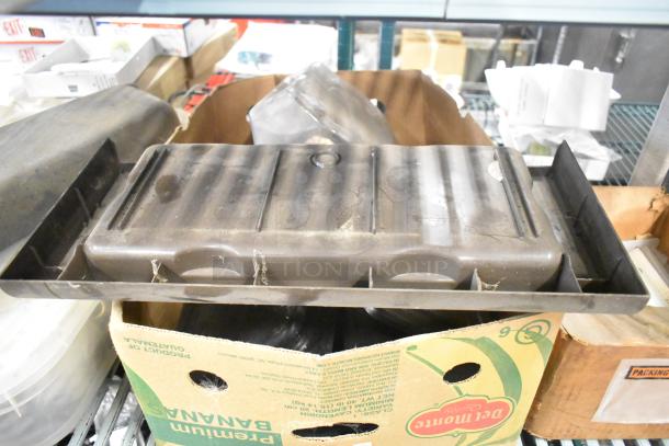 Tiered lot of Taylor ice cream machine parts and carbonated beverage machine adapters in used condition, various boxes.