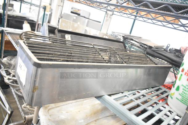 Tier lot of kitchen equipment including Turbochef kickplate, Taylor ice cream machine drip tray, carbonated beverage machine drip tray.