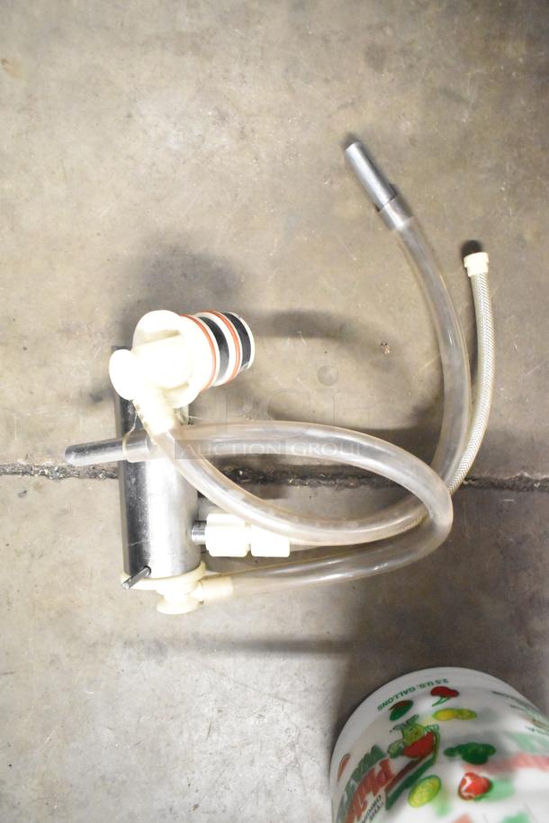 Tier lot with various items including a Turbochef kickplate, Taylor ice cream machine drip tray, and carbonated beverage machine drip tray.