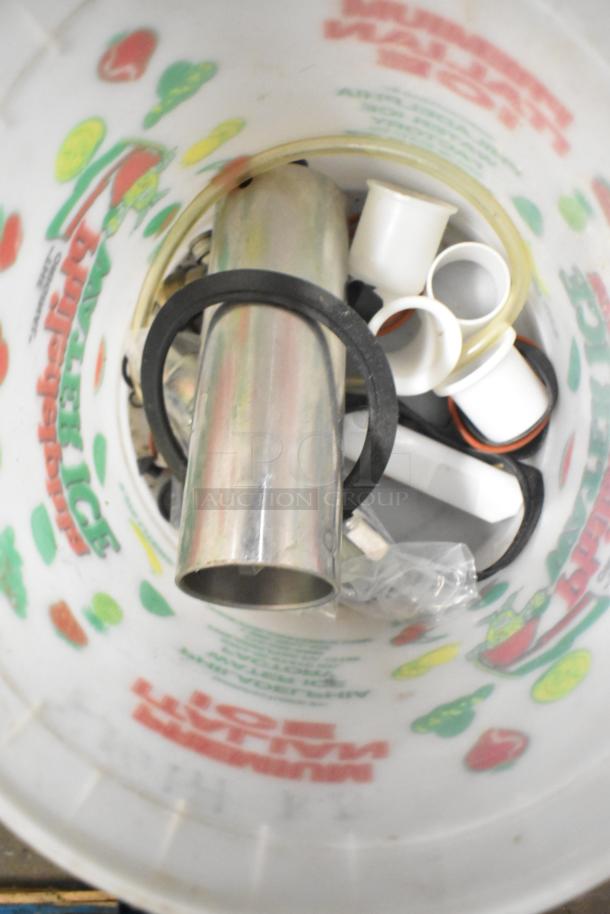 Tiered lot with Turbochef kickplate, Taylor ice cream machine drip tray, and carbonated beverage machine drip tray.