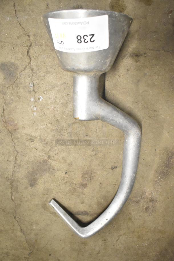 Metal dough hook for Hobart mixer, slightly worn. Attached tag reads "Qty 15, 238, PCIauctions.com".