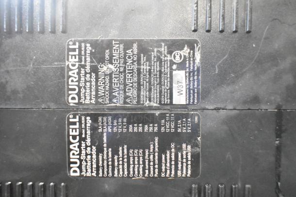 Duracell Jump Starter and Compressor, model DRJS20C, shows caution labels and specs for battery, charging, and USB outputs.