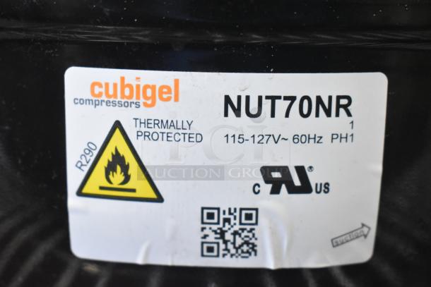 Cubigel NUT70NR Compressor, thermally protected, 115-127V, 1 Phase, R290, with standard safety and certification labels.