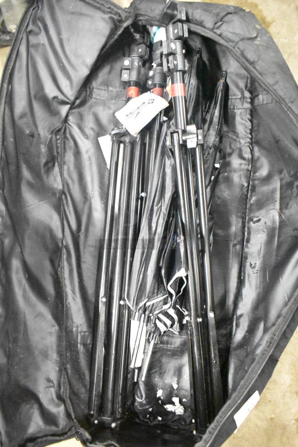LimoStudio Photography Set Up in black carrying case, containing tripods and accessories, in used condition.