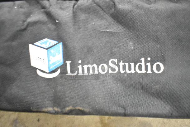 LimoStudio photography setup bag with logo, showing wear on fabric, includes essential gear for photo shoots.