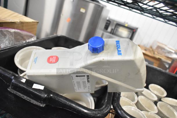Tier lot of items including white ceramic ramekins and black poly bus bins. Ecolab container with blue cap visible.