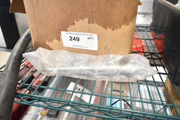 Auction lot including white ceramic ramekins and black poly bus bins. Label: "249, Tier lot," from PCIAuctions.com.