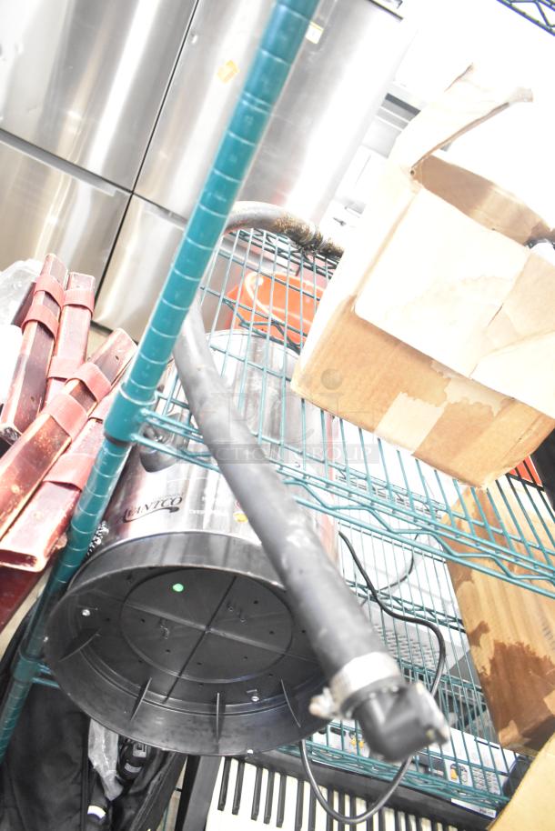 Tiered lot including white ceramic ramekins, black poly bus bins, and various kitchen items on metal shelving.