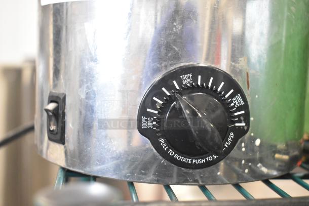 Server SBW countertop topping warmer, 120 volts, 1 phase. Features a temperature control dial and power switch. Visible wear.