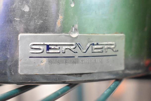 Server SBW countertop topping warmer, stainless steel with visible wear, 120 Volts, 1 Phase. Features brand logo.