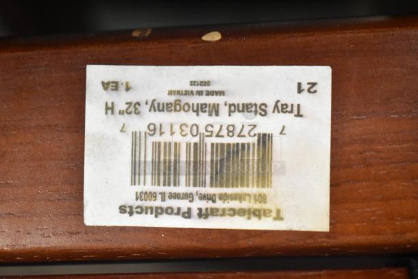 Five mahogany serving tray stands, 32" height. Tabelcraft Products. Made in Vietnam. Barcode: 2787503116.