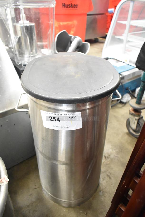 Bunn countertop beverage holder dispenser in stainless steel with black lid; item tag reads "254 QTY PCIauctions.com."