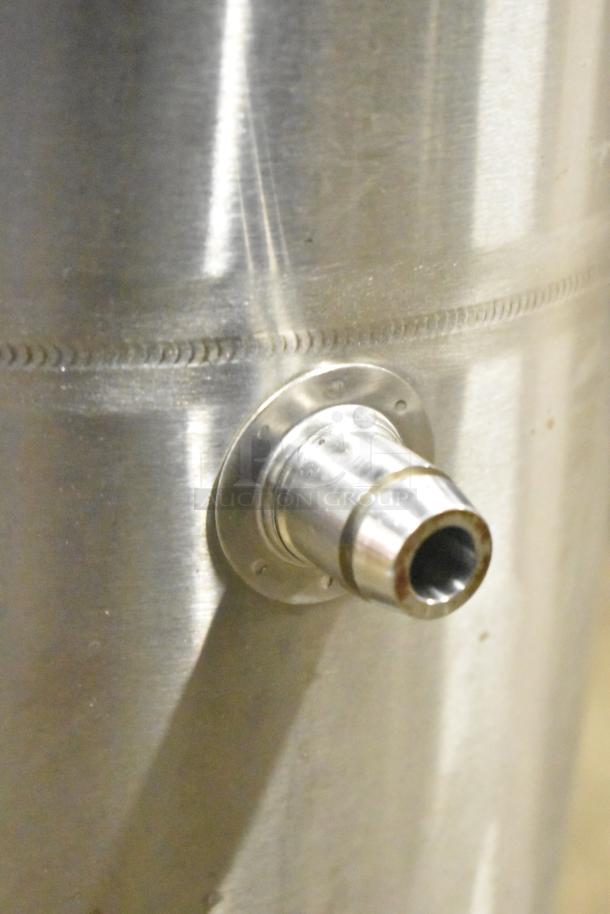 Bunn Countertop Beverage Dispenser, stainless steel, side view of spout, used condition.