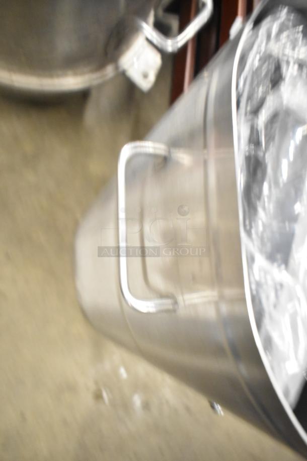 Stainless steel Bunn Countertop Beverage Holder Dispenser with metal handles, in good condition.