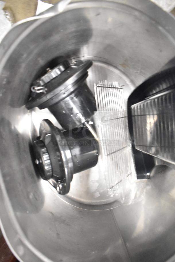 Bunn Countertop Beverage Holder Dispenser, stainless steel interior, includes dispensing components, in good condition.