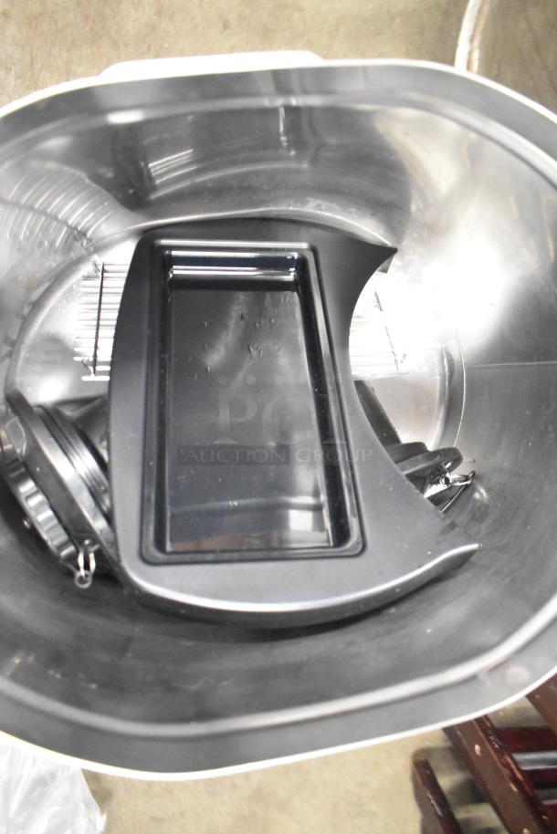 Bunn Countertop Beverage Holder Dispenser, stainless steel and plastic construction, gently used, clean interior, no visible markings.