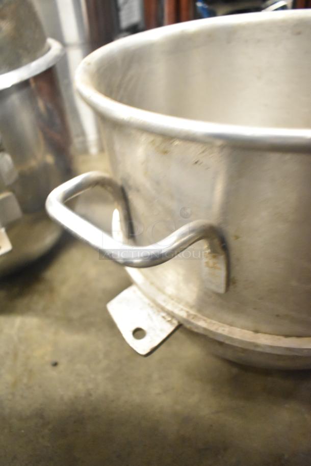 Set of 5 metal mixing bowls with sturdy handles, slightly worn condition, suitable for kitchen or bakery use.