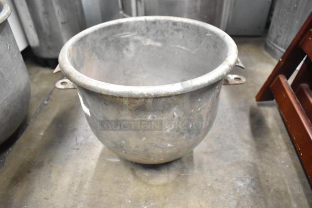 Metal mixing bowl, aged condition, with visible wear marks. Auction item includes five bowls, each enhancing bid value.