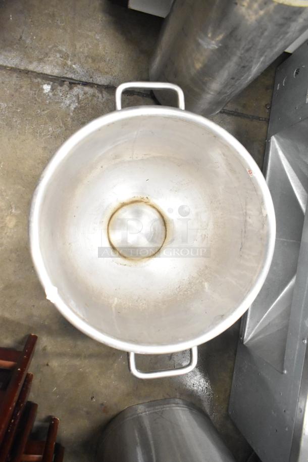 Set of 5 metal mixing bowls with handles, varying in size, used condition, suitable for kitchen or industrial use.