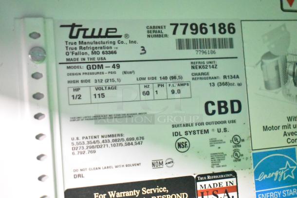 True GDM-49 Commercial Cooler label; 115V, 1 phase, 1/2 HP. Serial 7796186. Made in USA. R134A refrigerant. Suitable for outdoor use.