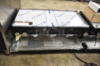 Brand new Gaggia MGV293NPU Vetro Black 3 Group Automatic Espresso Machine, 220/230V. Scratch and dent condition.