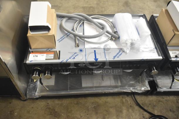 Brand new Gaggia MGV293NPU Vetro Black 3 group automatic espresso machine, 220/230 volts, minor scratches, with accessories.