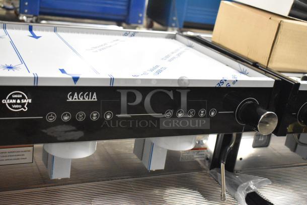 Gaggia MGV293NPU Vetro Black 3 Group Automatic Espresso Machine, brand new scratch and dent, controls visible, 220/230V, 1 phase.