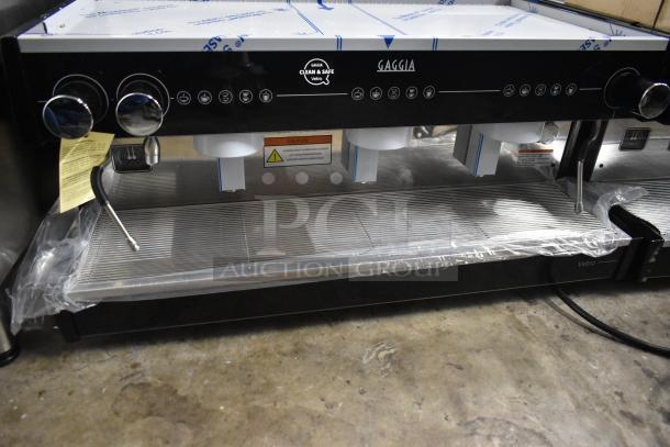 Brand new Gaggia MGV293NPU Vetro Black 3 Group Automatic Espresso Machine, 220/230V, scratch and dent condition.