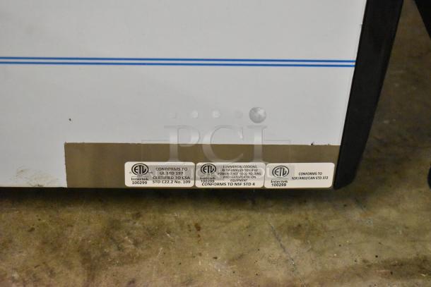 Gaggia MGV293NPU Vetro Black 3 Group Automatic Espresso Machine, brand new, scratch and dent condition. Labels show ETL certification.