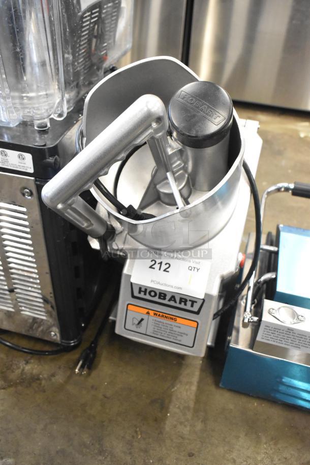 Hobart FP-150 countertop food processor, full moon pusher, 110-120V, 1 phase, visible Hobart branding, in used condition.