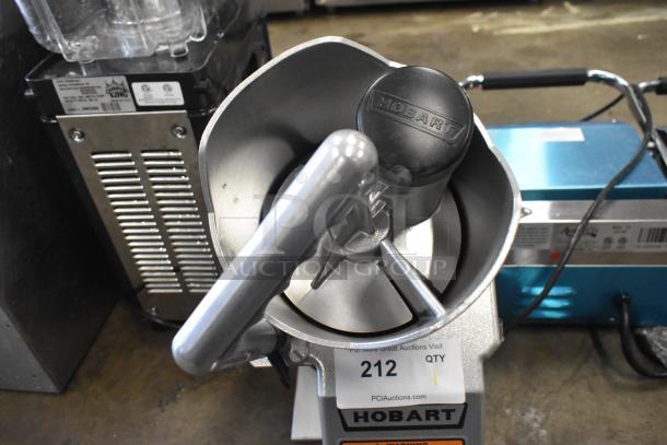 Hobart FP-150 countertop food processor with full moon pusher, 110-120 volts, 1 phase. Appears in good condition with visible brand label.