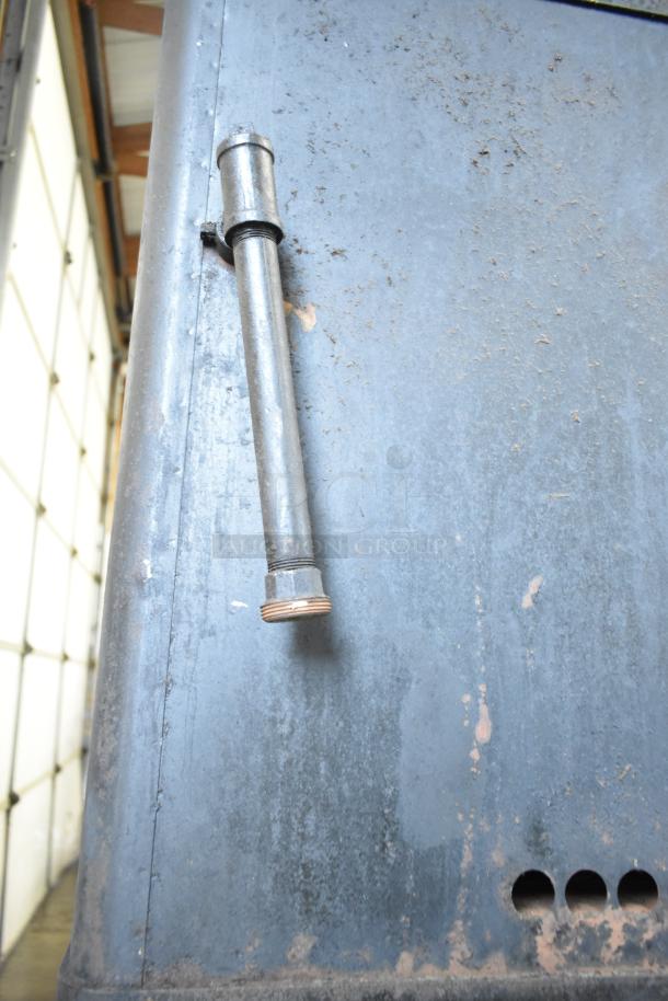 Blodgett commercial gas-powered pizza oven, 2-deck, showing metal pipe detail. Used condition, exterior wear visible.