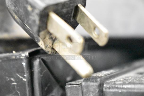 Close-up of plug for 5020 Countertop Waffle Cone Maker. 120 volts, 1 phase. Slight wear on prongs.