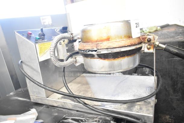5020 countertop waffle cone maker, 120 volts, model 5020. Visible wear and patina on metal surfaces.