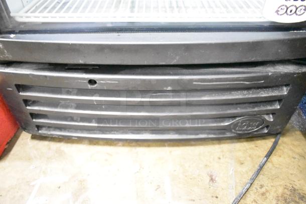IDW G-12-F334B-HC cooler front grille with visible scratches, showing IDW logo, 115V, 1 phase power cable attached.
