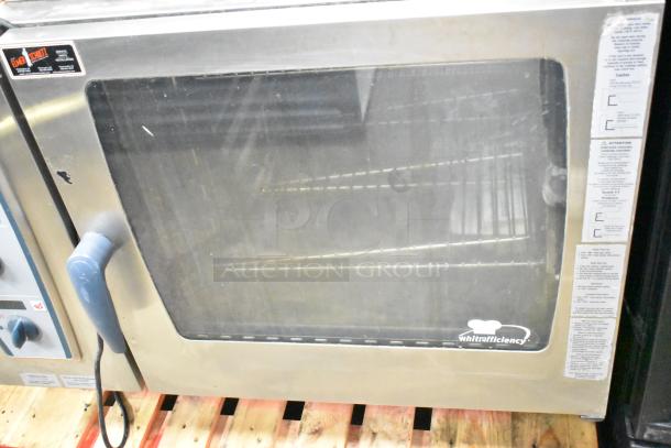 Rational CMP62G CombiMaster Plus Gas Convection Oven with stand; 79,500/106,000 BTU; visible controls, minor wear.