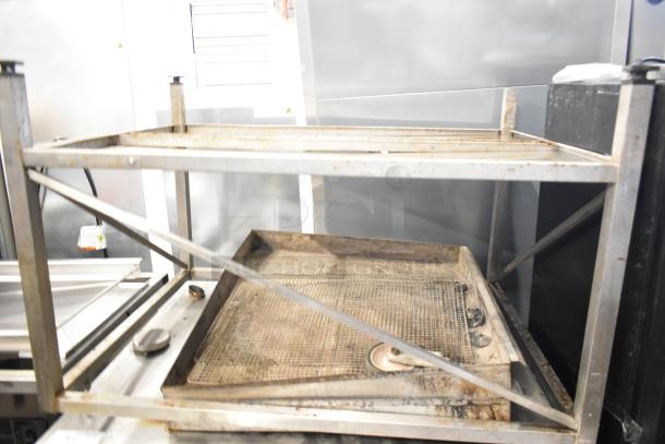 Rational CMP62G CombiMaster Plus Gas Oven with stand, showing exterior wear, ideal for commercial kitchens.