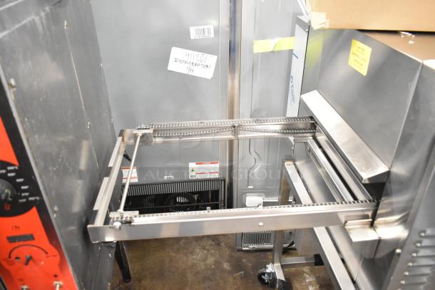 Brand new 2025 Belshaw Adamatic TG-50 stainless steel thermoglazing station, scratch and dent, 208V, 1 Phase, on casters.