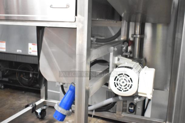 Brand new Belshaw Adamatic TG-50 Thermoglazing Station, stainless steel, on commercial casters. 208V, 1 phase. Scratch and dent condition.